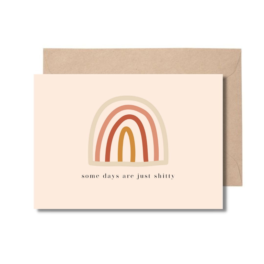 Greeting card with minimalist rainbow design and text 'some days are just tough' on beige background
