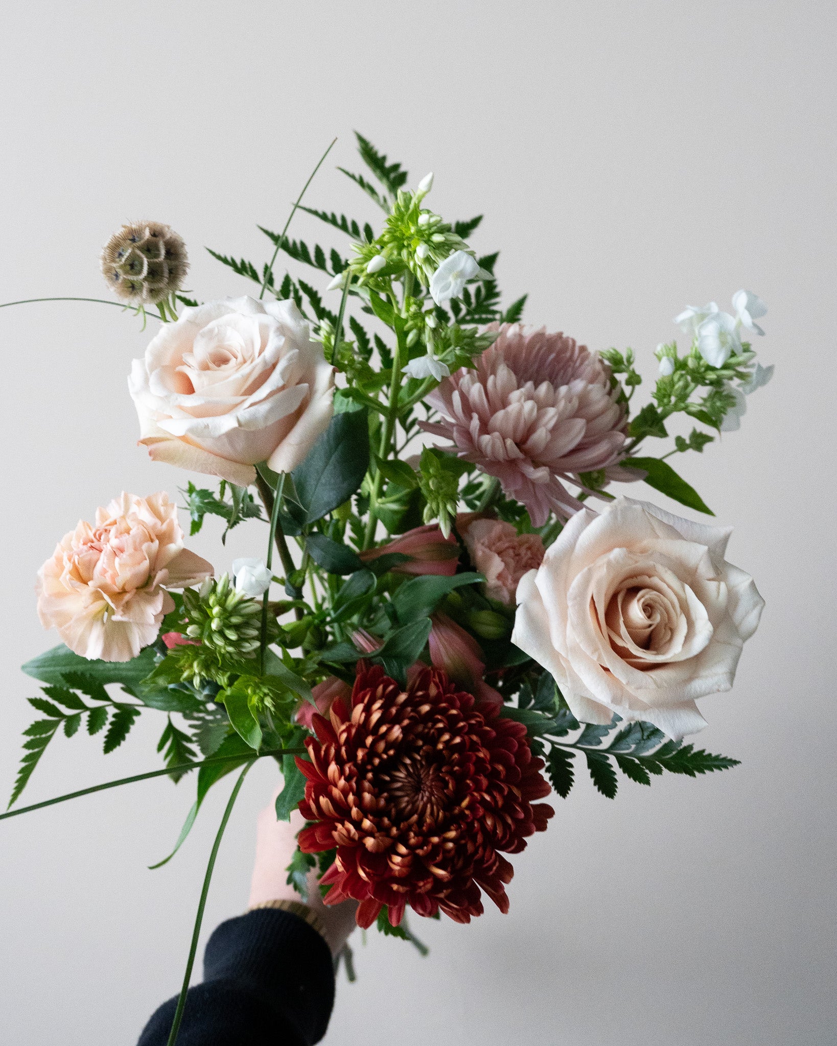 Bouquet of flowers with white, pink, and red colors for delivery or pickup in Toronto.