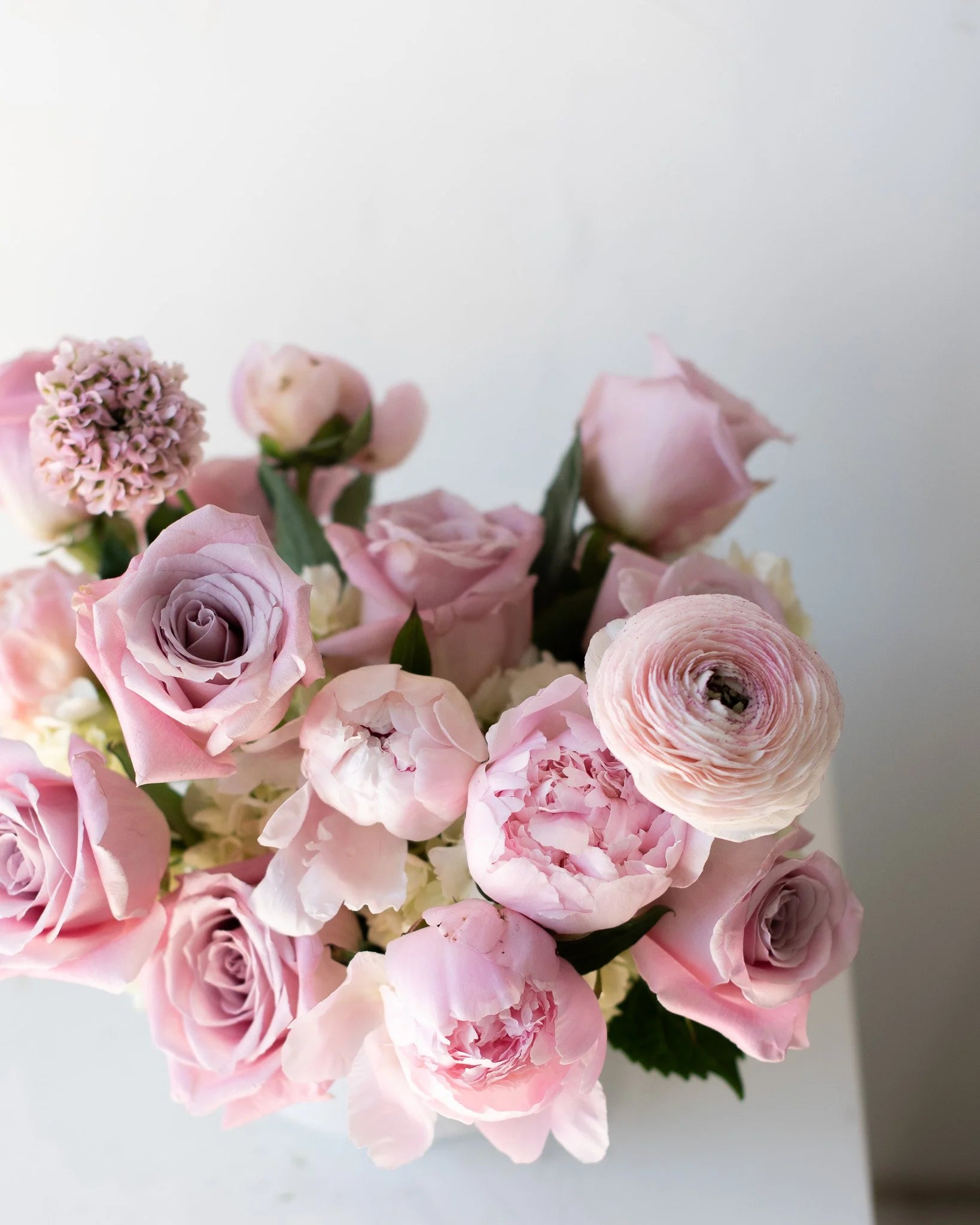 Modern pink floral arrangement with roses and peonies by Annam Studio Toronto