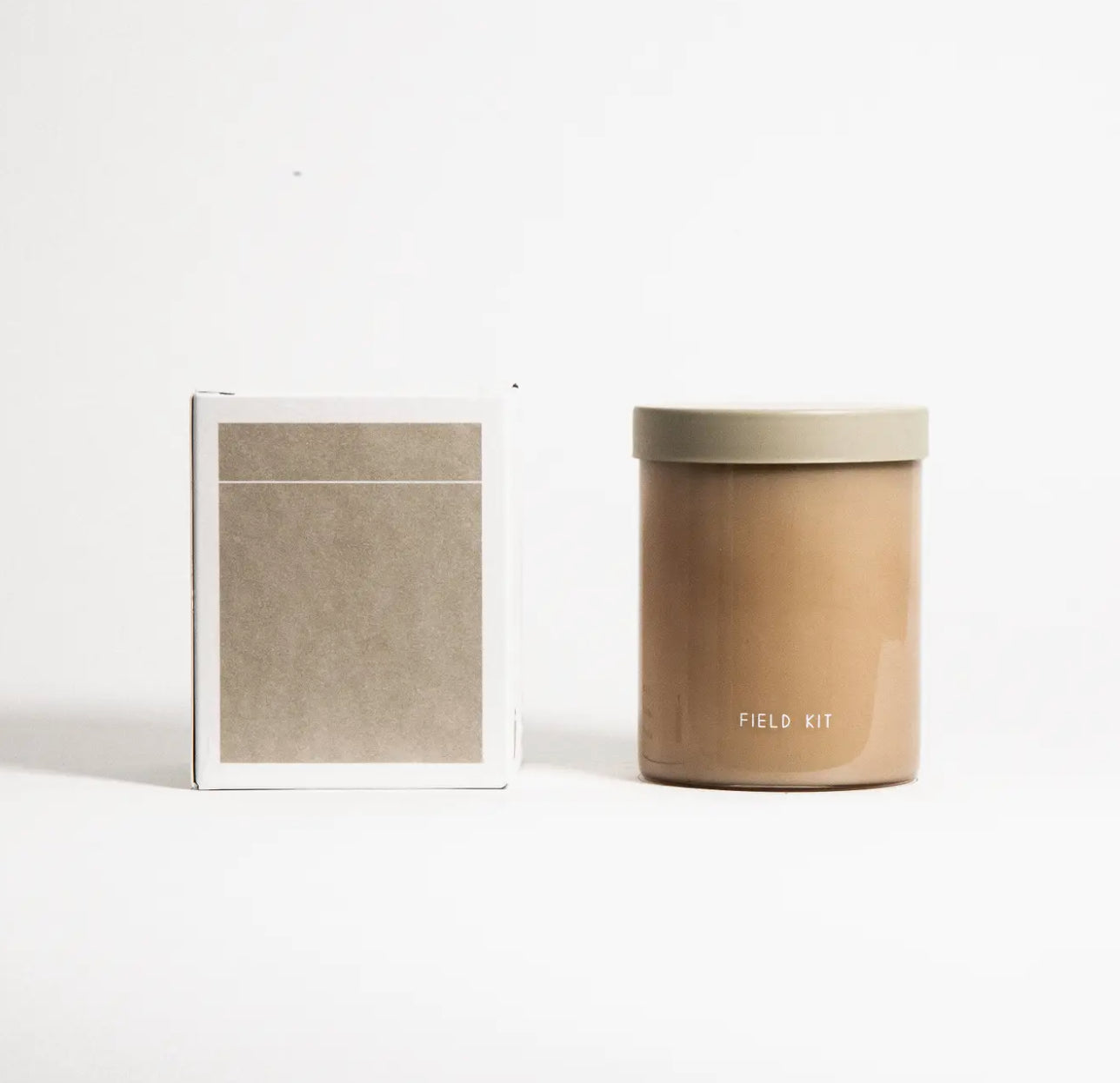 Minimalist tan Field Kit candle and box gift set on white background from Annam Studio
